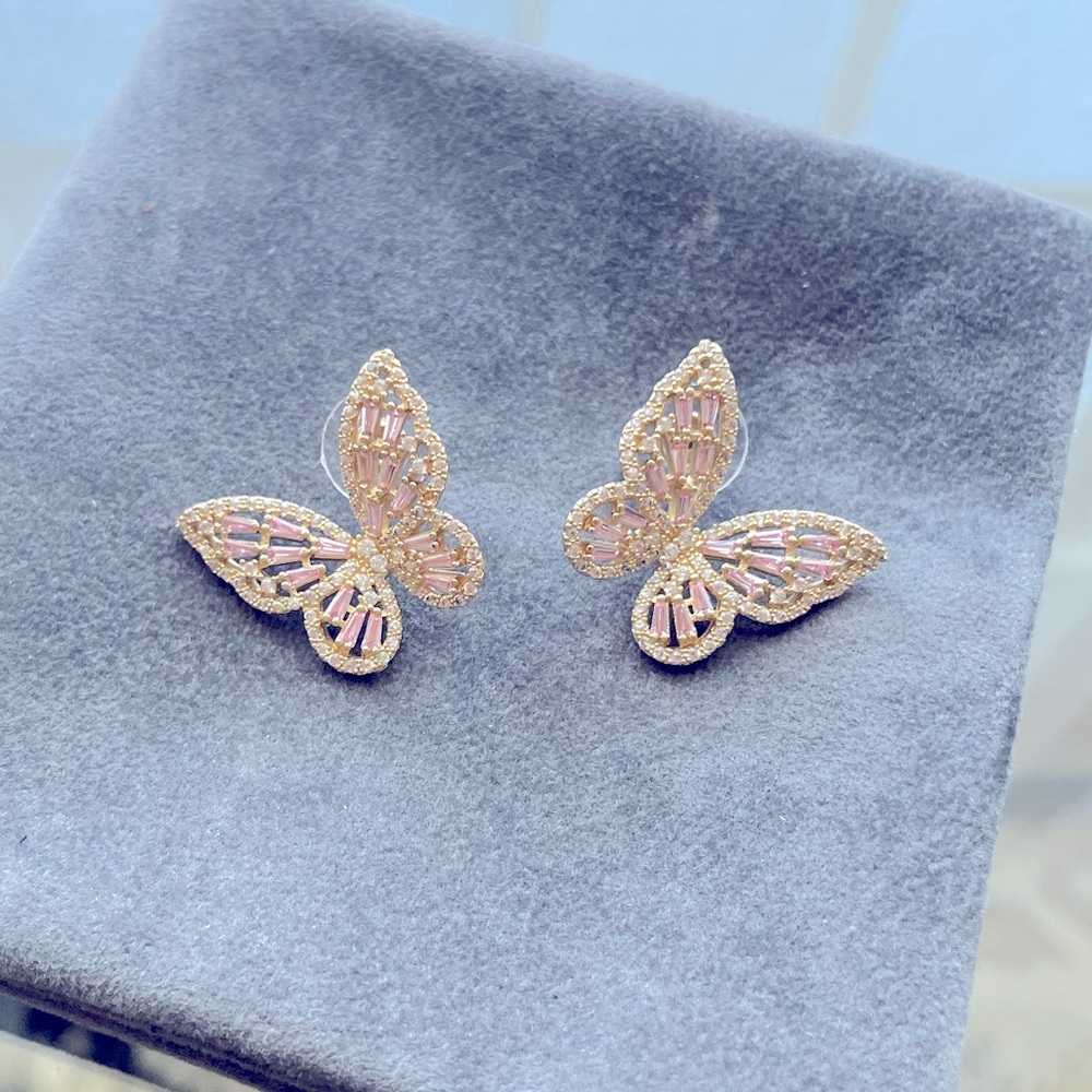 Butterfly stud earrings. Pink and white stones cz and crystals. 18k gold plated.